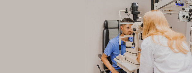 Young beautiful woman doctor/eye specialist/optometrist in an ophthalmologic clinic