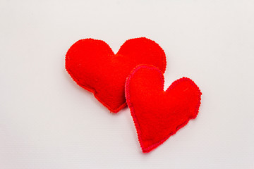 Red felt hearts isolated on white background. Valentines Day or Wedding romantic concept