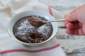 Cocoa pudding on the wooden table,top view.
