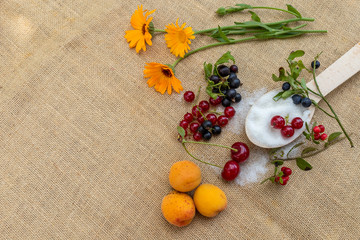 Fototapeta na wymiar berries and fruits with sugar