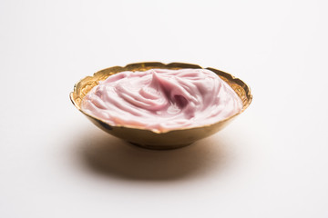 Black grapes, yogurt and honey mix face mask or cream forskin dark spot removal treatment, created using Angoor extract, curd and honey. selective focus
