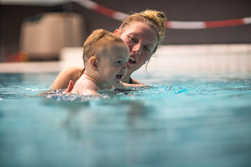 Mom and baby swimming