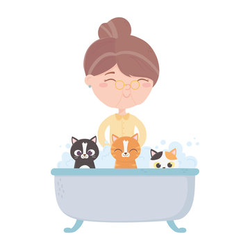 cats make me happy, old woman cat and kitten in bathtub