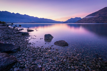 Amazing and colorful morning by a lake on South Island of New Zealand. Pure natural scene,...
