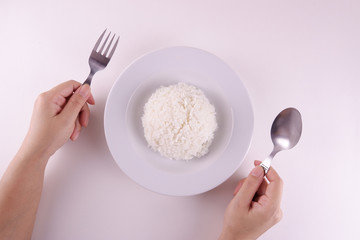 White Rice on white ceramic plate