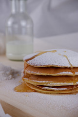 Hot pancake with sugar and honey toppings