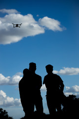 Fototapeta na wymiar silhouette of drone pilots