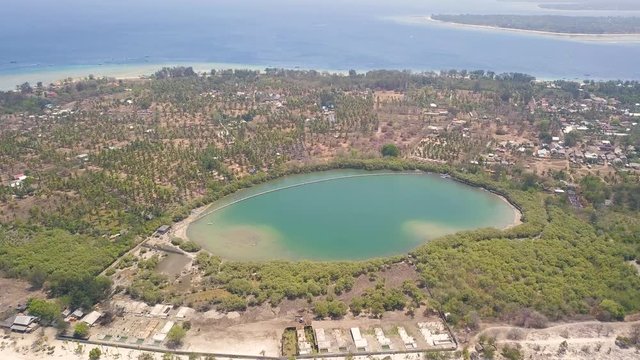 Aerial view of leake near the sea shore in West Nusa Tenggara, Indonesia