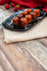 Canele is a small French pastry with rum and vanilla