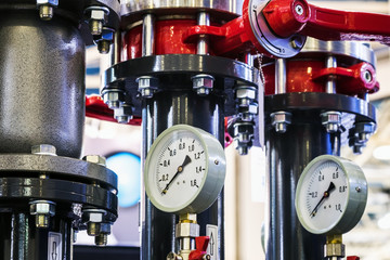 pressure gauges and pipes of a block heat point with a pump module. Details of the block heat point