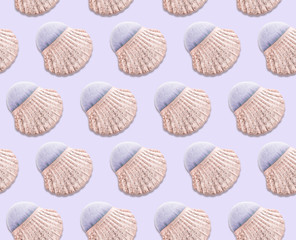 Seamless pattern of shell shaped brush isolated on soft powder blue. Trendy beauty pattern for your design