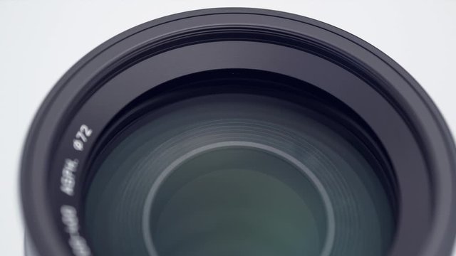 4K - Close-up of a photo lens with lens flare