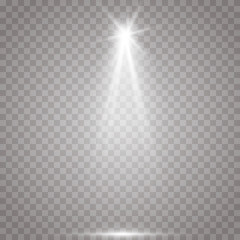 The spotlight shines on the stage. light exclusive use lens flash light effect. light from a lamp or spotlight. lighted scene. podium under the spotlight.