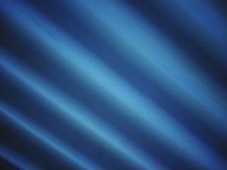Shiny corrugated metal texture. Abstract blue background