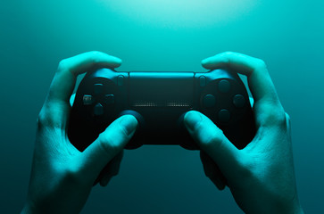 Stock photo of hands holding a gamepad © AdriaVidal