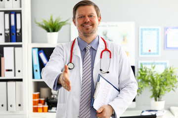 Physician ready to examine patient