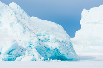 Icebergs on frozen sea, Greenland.