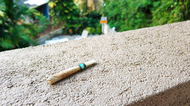 a cigarette twisted from a dry leaf. Time to rest