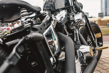 Naklejka na ściany i meble Powerful heavy motorcycle with chrome parts in the parking lot