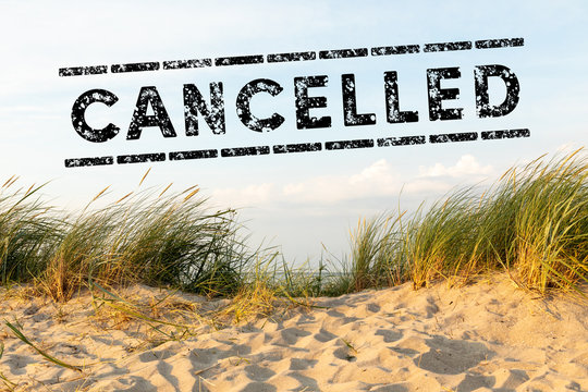 dunes on sunny day and text cancelled - vacation cancel