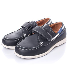 Children's black leather shoes for boys isolated on white. Side view