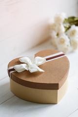 Love and holiday greeting concept background. Symbol of love. Floral decor on the background.