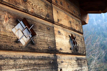 Cravegna (VCO), Italy - December 19, 2017: An old window with a iron grate, Vigezzo Valley, VCO, Piedmon, Italy