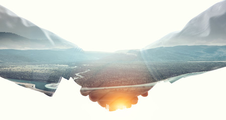 Partnership concept. Image of handshake