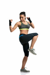 young woman doing fitness exercise isolated on white