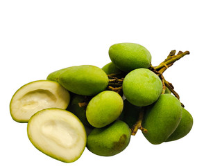  The green mango has a sour taste tied to some of the fruits seen inside.