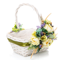 Fototapeta na wymiar Hand made Easter basket Provence style decorated ribbons, flowers isolated on white background.
