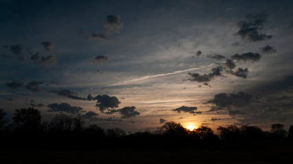 Sunrise with moody clouds