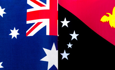 fragments of the national flags of Australia and Papua New Guinea close up