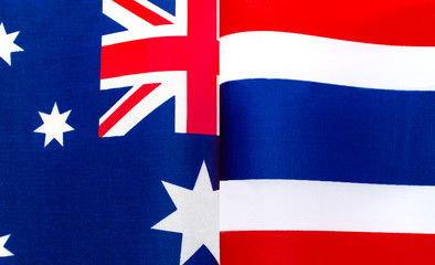 fragments of national flags of Australia and the Kingdom of Thailand close up