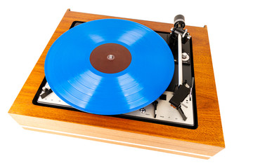 Fototapeta premium Vintage turntable with a blue vinyl isolated on white