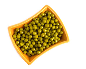 green peas in a bowl isolated on white background