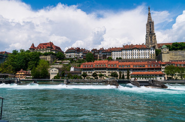 Obraz premium Bern City Switzerland Aarau Aare river side view of the Cathedral sunny day with clouds