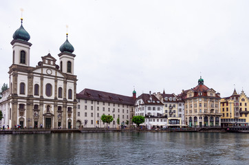 Fototapeta na wymiar View of the Jesuit Chruch in Lucerne Switzerland from the other side of the Reuss river
