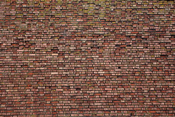 Texture of the Old Red Brickwork. Background image based on the fortress Brick Wall of the Kolomna Kremlin