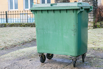 Green, plastic, clean garbage container. Ecology concept.