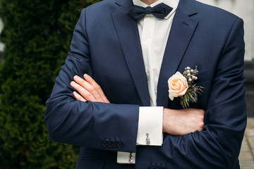 Boutonniere on the lapel of the groom
