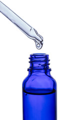 Dropper serum and brown glass bottle isolated on white background. Skin care beauty, drug and cosmetic concept.