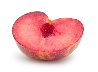 Red plum cut in half isolated on white background. Fresh plum clipping path.
