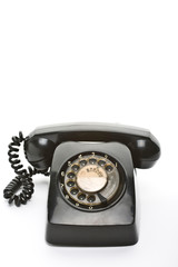 Old black classic dial telephone.