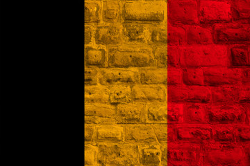 national flag of modern state of belgium on old historical stone wall, concept of business, tourism, travel, emigration, globalization