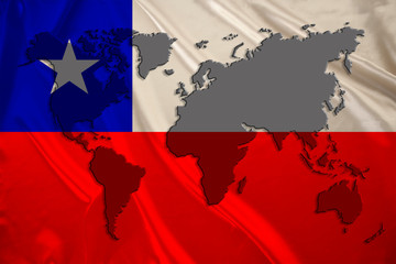 silhouette of a world map on the silk national flag of the modern state of Chile with beautiful folds, the concept of tourism, travel, emigration, global business
