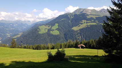 View from a mountain in the Swiss Alps in summer