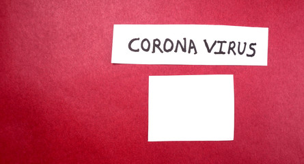 Note COVID-19 /coronavirus on white paper on the red background. Economy and financial markets affected by corona virus. flat lay, Space for text.
