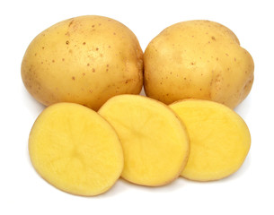 Young potato and slice isolated on white background. Harvest new. Flat lay, top view