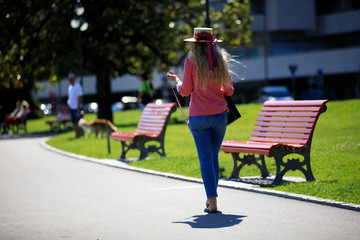 Lugano / Switzerland - June 01, 2019: Tourist walking near Lugano lake, Lugano, Switzerland, Europe